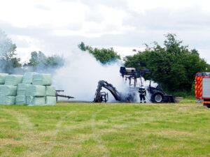 Brand i gravemaskine